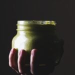 A jar of creamy poblano sauce.