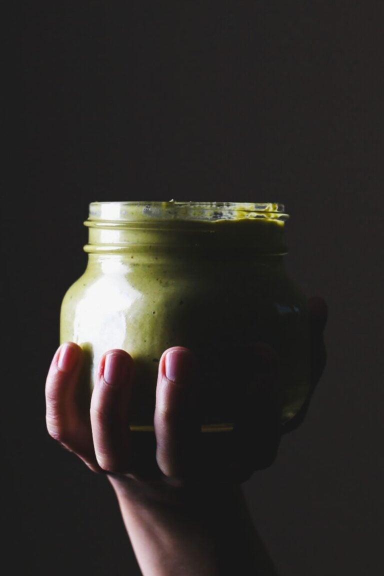 A jar of creamy poblano sauce.